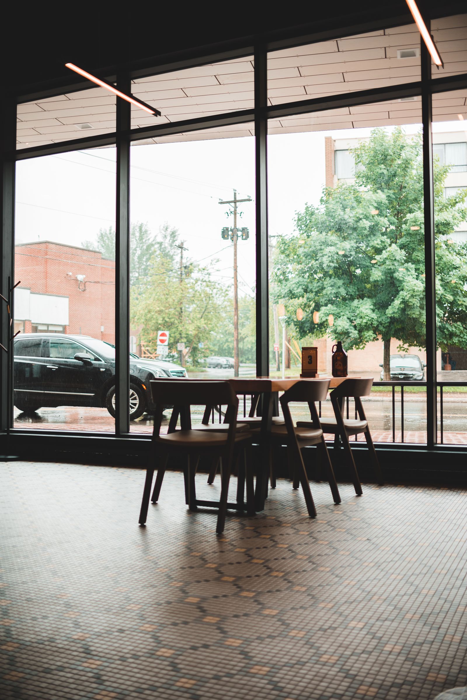 A bright cafe interior with large windows